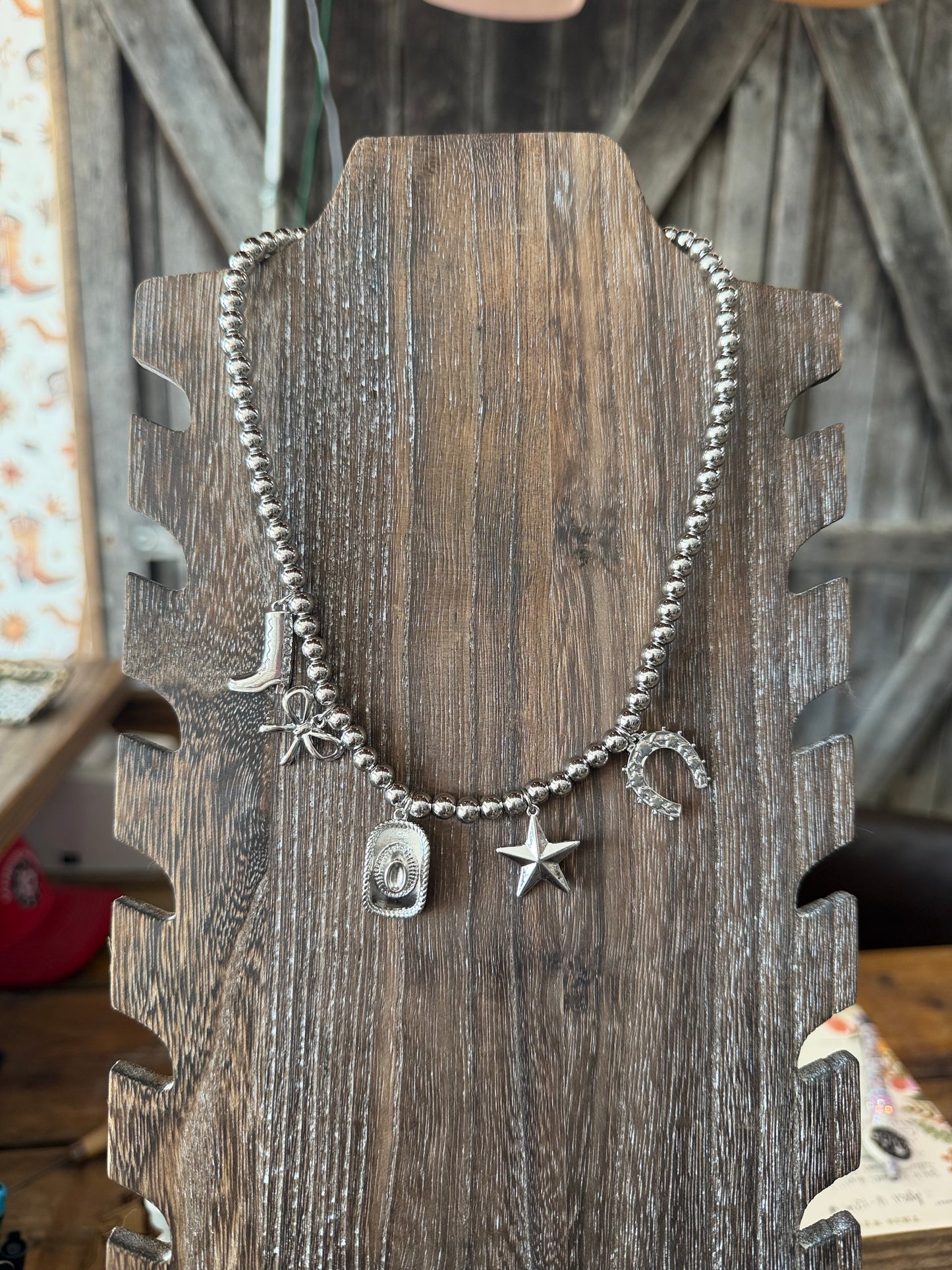 Silver beaded charm necklace